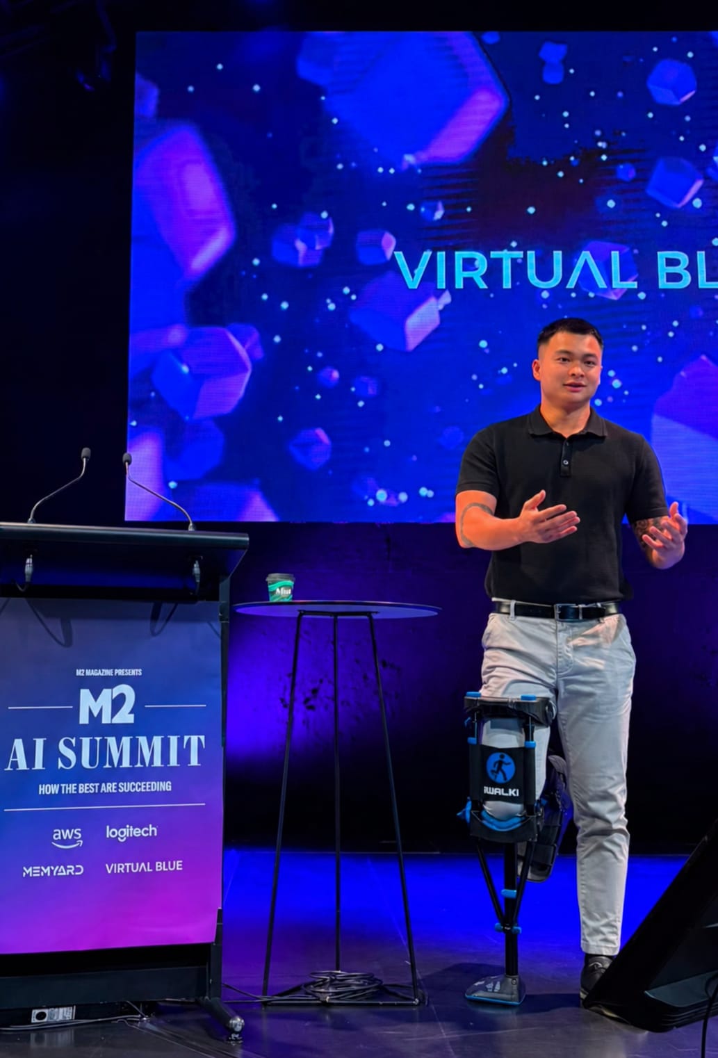 Owen Chau speaking at the M2 AI Summit